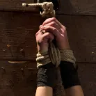 Rene Phoenix in 'Tiny sexy blond suffers heavy weighted nipple clamps and a crotch burner that keeps her on her toes!'