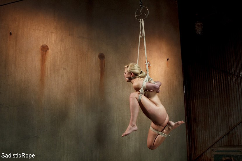 Hot Blonde with Big Tits in Brutal Predicament Bondage