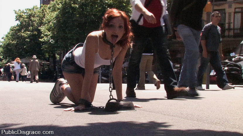 Beautiful Spanish redhead tied up, stripped bare, and fucked on the streets