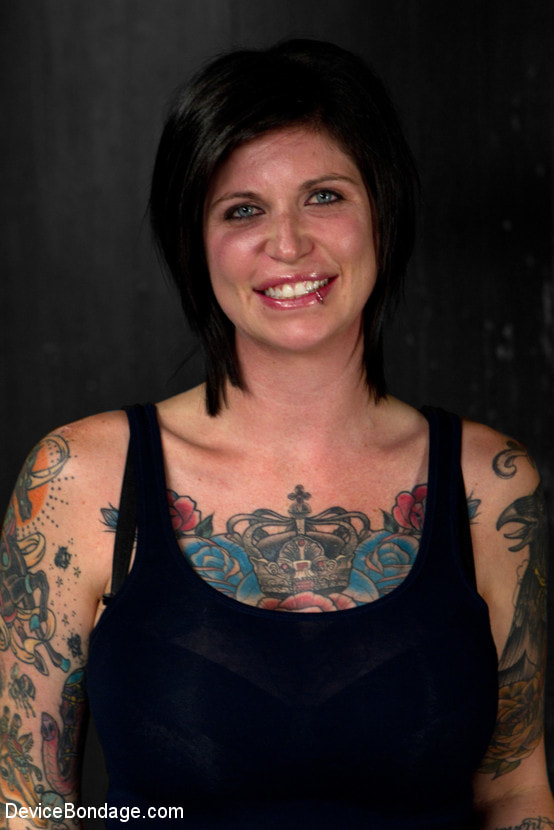 Kathryn Dupri Submits to Leather Restraint