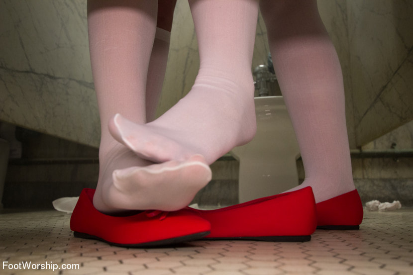Playing Footsies In The Girls Room